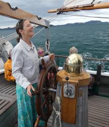 Alison at the helm of the R. Tucker Thompson